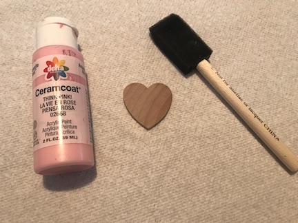 Painting a wooden heart for the scrap wood bunny nose