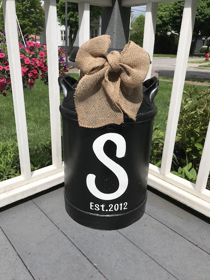 Add farmhouse charm to your porch with a decorative milk can. Turn someone else trash into treasure with a few easy steps to add curb appeal to your home. 