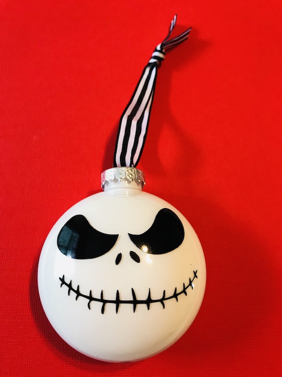 Tim Burtons The Nightmare Before Christmas is my son's favorite movie. If you know anyone who loves this Disney Classic, learn how to make a DIY Jack Skellington Christmas Ornament. It looks great on a Halloween tree too! #JackSkellington #Christmas #ChristmasOrnmanent #DIY 