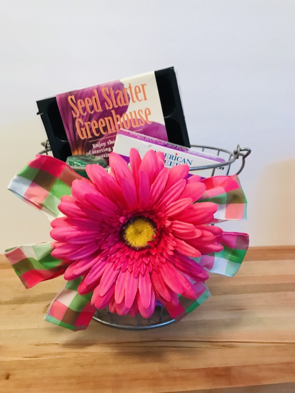 Gardening gift baskets are perfect for moms or anyone who loves to garden. Find a cute bucket at the trift store and fill it with gardening goodies from the dollar tree. #Gardening #GiftBaskets #Momgifts #Upcycle #MothersDay #BirthdayGift 
