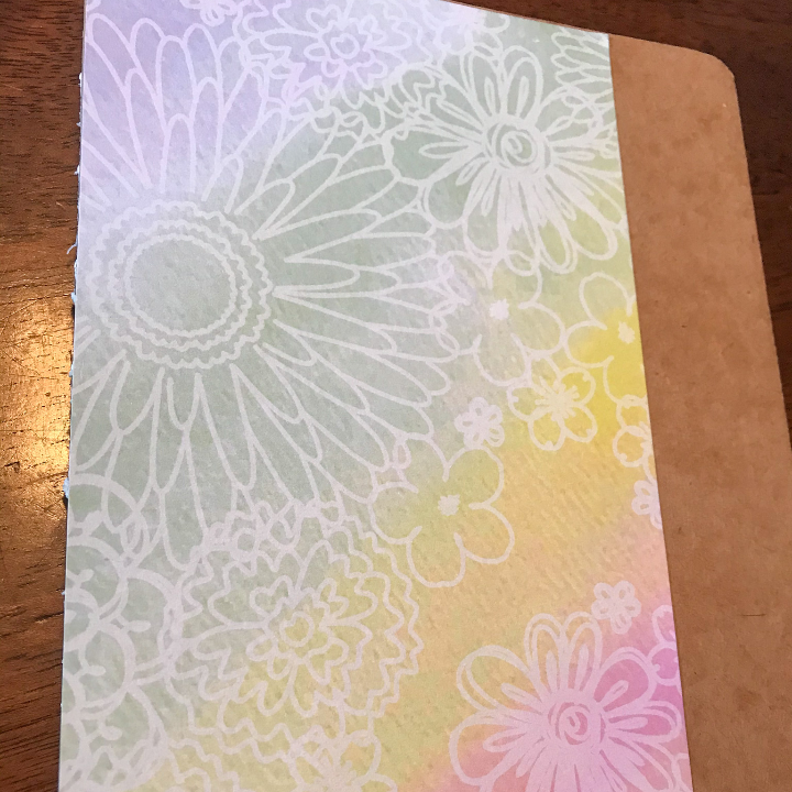 Cricut Adhesive Paper on the notebook cover