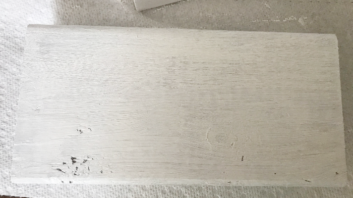 Painting the 2x4 with white chalk paint