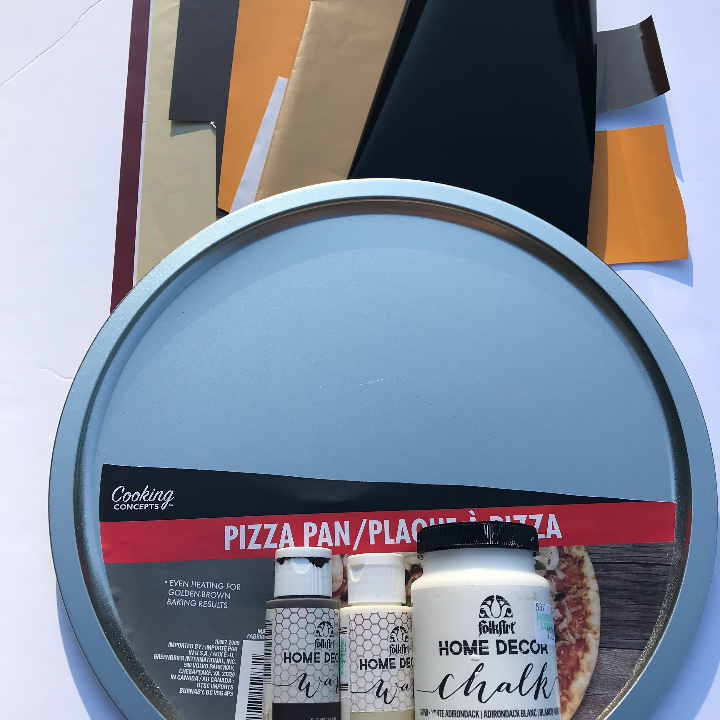 Materials for the fall dollar tree pizza pan craft