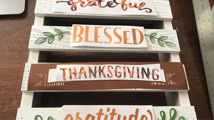Weed the vinyl design for the Cricut Thanksgiving project