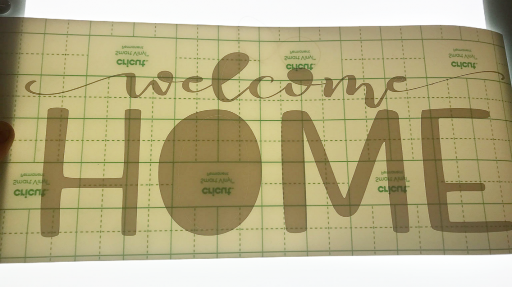 Weeding the Smart Vinyl to make the Welcome Home Sign