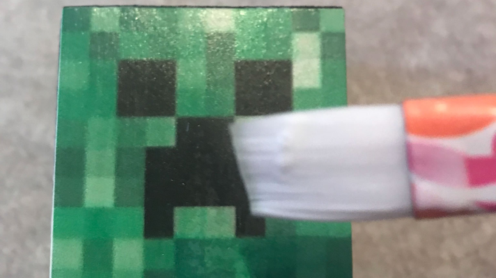 Add Mod Podge on top of the Minecraft Creeper to seal it