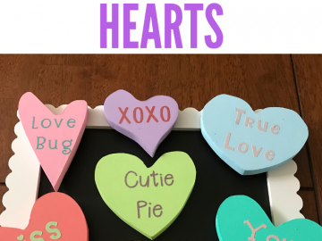 Conversation hearts are a huge part of Valentine's Day so add some to your decorations with these easy DIY wooden hearts. The kids will love painting them as a craft project. They look great as a centerpiece on the table and add romance to your table setting. #ValentinesDay #valentines #Valentinesdecorations #DIY #ValentinesDayCraft