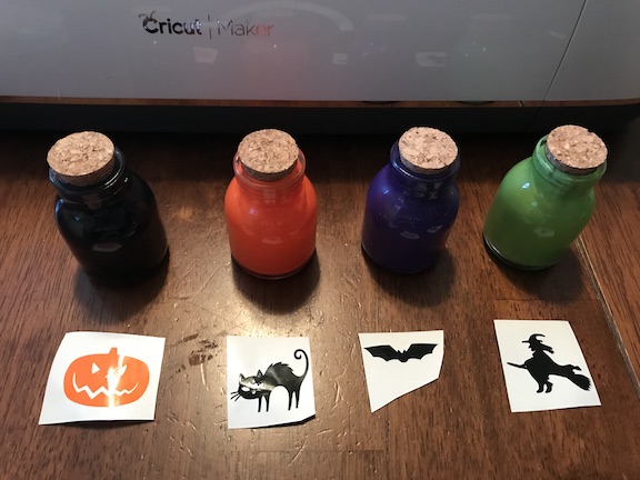 Adding vinyl images to Halloween Potion Bottles 