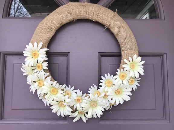 Using old florals from grapevine basket to make an outdoor wreath for the shed