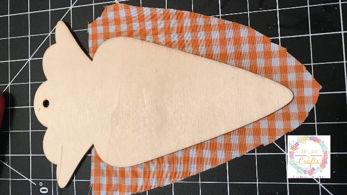 Cutting out the fabric for the carrot Easter Decorations 