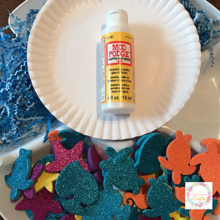 Supplies for ocean themed paper plate craft for kids